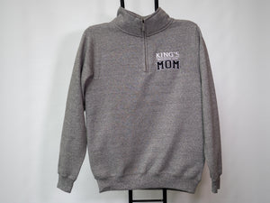 King's Mom Sweater. What a wonderful way to recognize all the King's "Moms" out there!  Soft heather grey, quarter zip sweater 52% Cotton, 48% Polyester Embroidered white and black logo